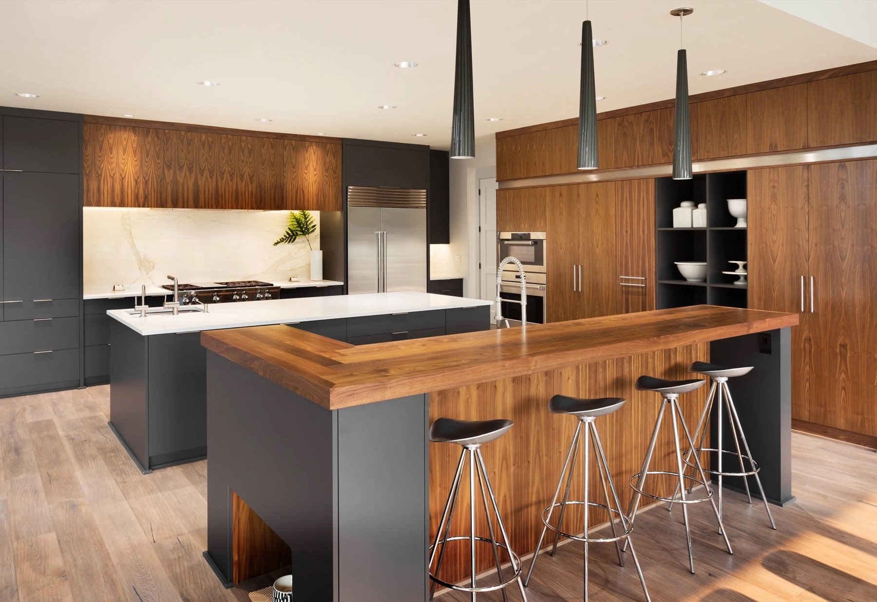 Custom walnut kitchen by Magnolia Cabinet Co.