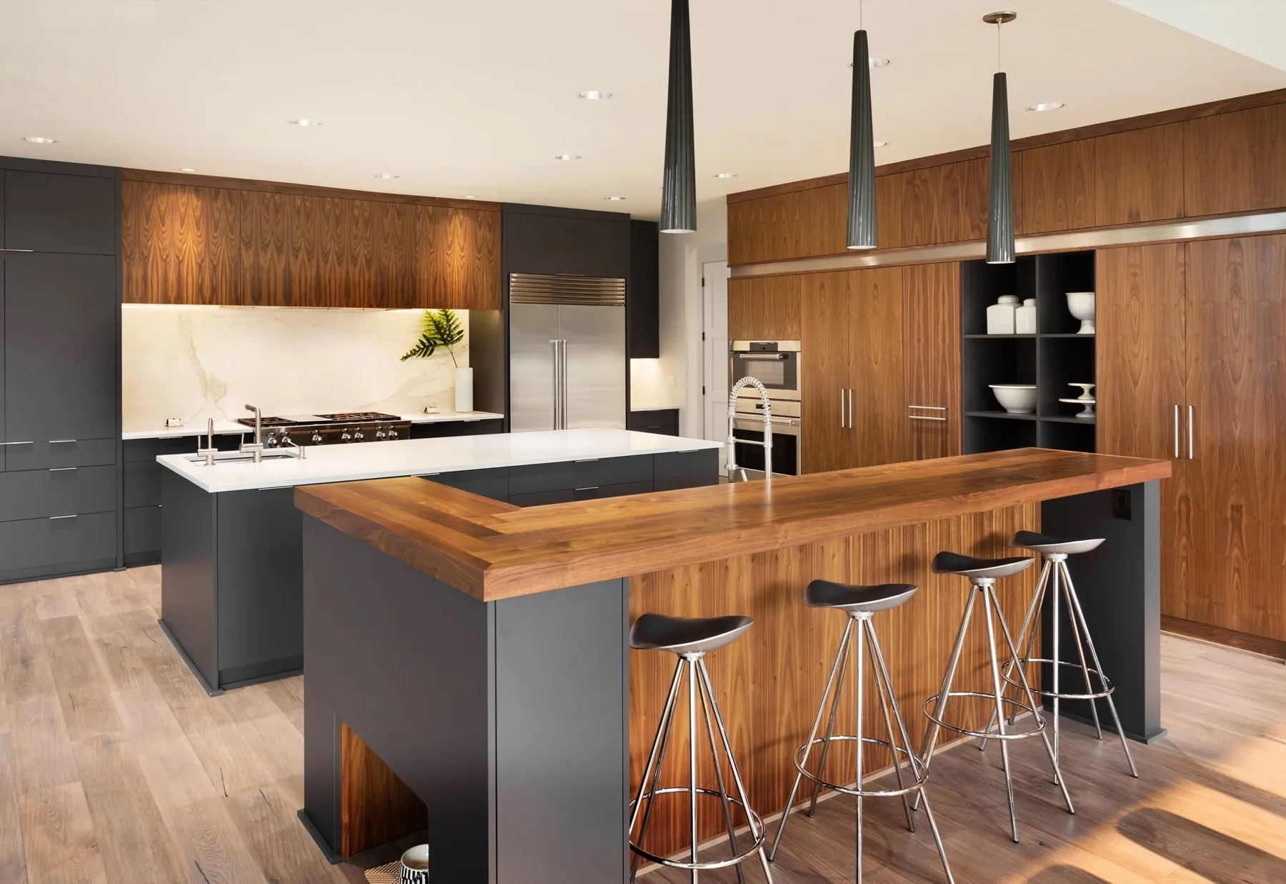 Custom walnut kitchen by Magnolia Cabinet Co.